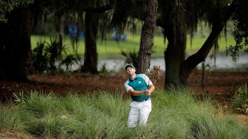 A little tall grass is not enough to get between Sergio Garcia and a third-round 67 at the Players Championship on Saturday. At 5 under for the tournament, Garcia is tied for seventh entering the final round. (Andy Lyons/Getty Images)