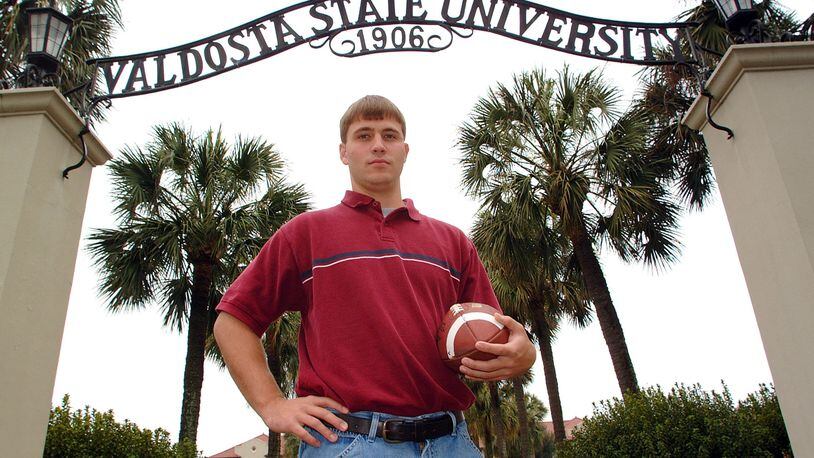 Valdosta State quarterback Buster Faulkner is pictured in the school's archway during the 2002 season. Twenty years later, he was hired as offensive coordinator at Georgia Tech. (Todd Stone/AP file photo)
