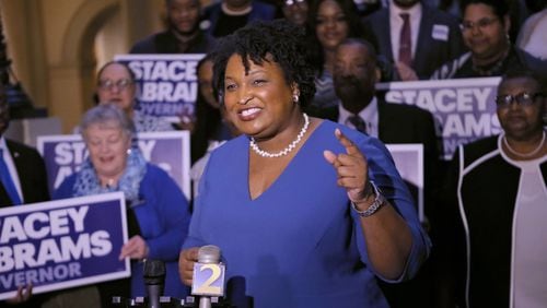 Gubernatorial candidate Stacy Abrams said she played no role in securing state contracts for a company that she co-founded and from which she drew a salary as a senior vice president. Abrams says she scrupulously avoided conflicts of interest while the company had the contracts. BOB ANDRES /BANDRES@AJC.COM