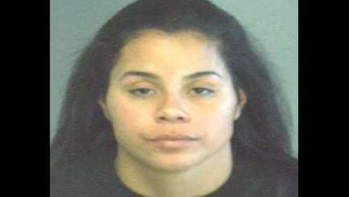 Audrey Francisquin is accused of posting nude photos of a coworker to Instagram and Snapchat in DeKalb County.