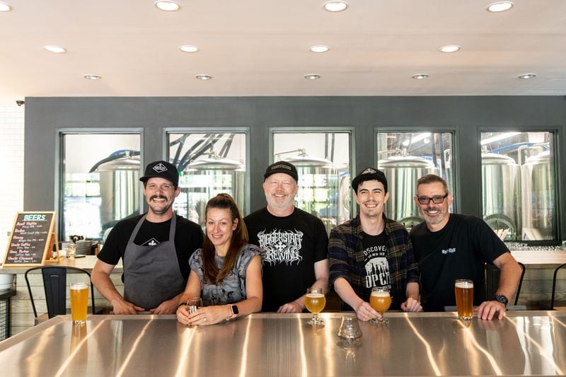 Biggerstaff Executive Chef Davis King, Owners Sarah, Clay, and Cole Davies, and Director of Brewing Operations Chris Collier. (Mia Yakel for The Atlanta Journal-Constitution)