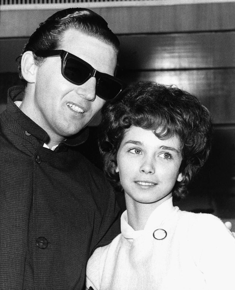 Jerry Lee Lewis and Myra return to London in 1962 for the first time since his ill-fated 1958 tour. Their three-year-old son Steve had drowned in the family's swimming pool two weeks earlier. (AP Photo)