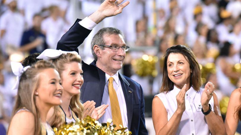 Georgia Tech new AD Todd Stansbury waves to fans during Georgia Tech Yellow Jackets game against the Clemson Tigers at Bobby Dodd Stadium on Thursday, September 22, 2016. HYOSUB SHIN / HSHIN@AJC.COM