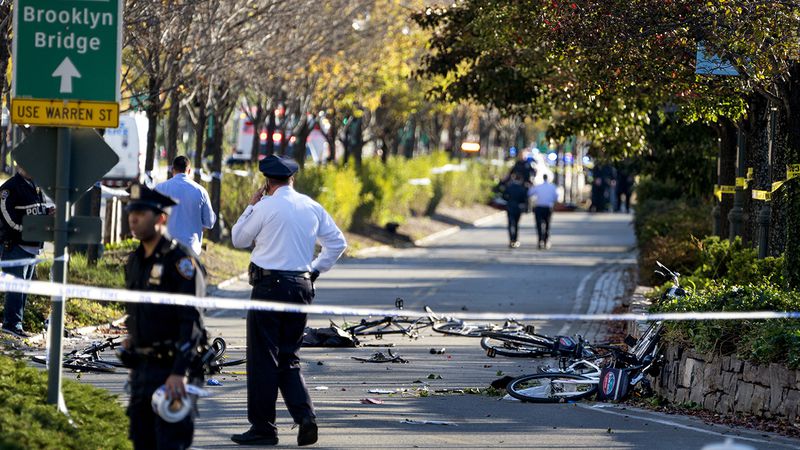 Bicycles and debris lay on a bike path after a motorist drove onto the path near the World Trade Center memorial, striking and killing several people Tuesday, Oct. 31, 2017.  (AP Photo/Craig Ruttle)