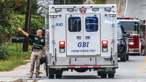 A GBI vehicle arrives at the scene of a police-involved shooting Wednesday in Forest Park.