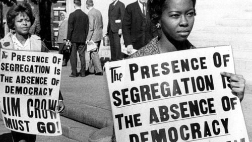 Atlanta University students picket against segregation at the Georgia State Capitol in this February 1962 file photo. (Bill Wilson/The Atlanta Journal-Constitution)