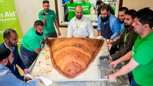 At an East London mosque, volunteers with the Muslim Aid UK charity broke the Guinness World Record for the largest samosa to ever be created.