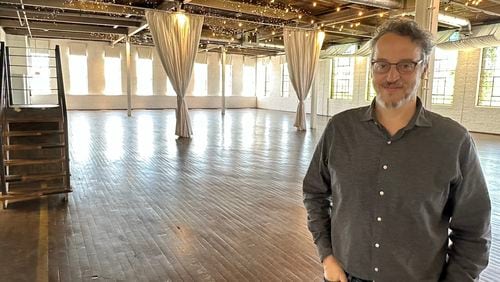 Ambient + Studio in Atlanta head Jason Ivany said TV and film -related business has dried up with the writers strike in hand. RODNEY HO/rho@ajc.com