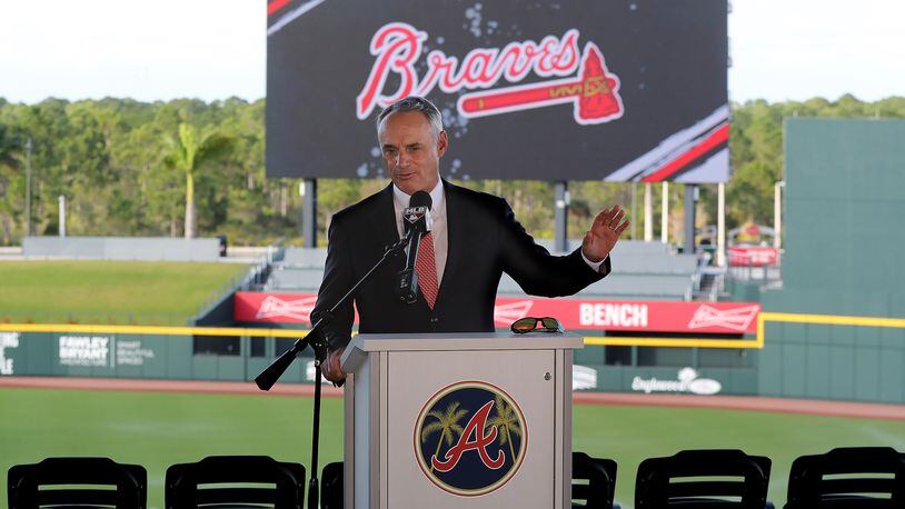 MLB commissioner Rob Manfred takes questions during his news conference at Braves spring training in February. (Curtis Compton/ccompton@ajc.com)