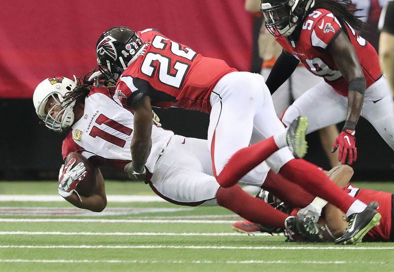  November 27, 2016, Atlanta: Falcons safety Keanu Neal levels Cardinals wide receiver Larry Fitzgerald with a hard hit during the fourth quarter and is called for a personal foul on the play in an NFL football game on Sunday, Nov. 27, 2016, in Atlanta. The Falcons beat the Cardinals 38-19. Curtis Compton/ccompton@ajc.com