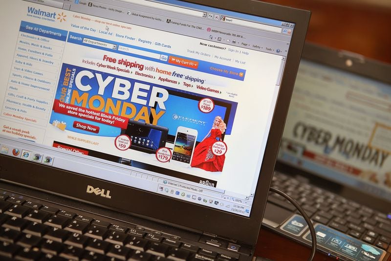 Retailers advertise Cyber Monday deals on their websites on November 26, 2012 in Chicago, Illinois. Americans were expected to spend $1.5 billion while shopping online that day, up 20 percent from the previous year.  (Photo by Scott Olson/Getty Images)