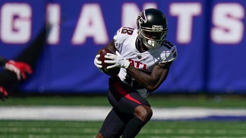 Falcons wide receiver Calvin Ridley (18) runs the ball during the first half of an NFL football game against the New York Giants, Sunday, Sept. 26, 2021, in East Rutherford, N.J. (AP Photo/Seth Wenig)