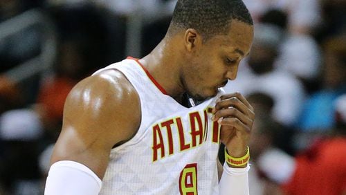 Former Hawks center Dwight Howard comes out of the game in the third quarter and did not return during a Game 6 playoff loss to the Washington Wizards. (Curtis Compton/ccompton@ajc.com)
