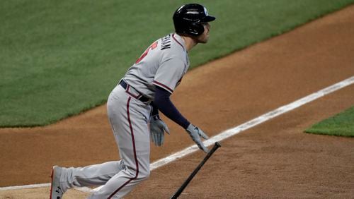 Atlanta Braves' Freddie Freeman watches his double during the first inning of the team's baseball game against the Miami Marlins, Saturday, Aug. 15, 2020, in Miami. (AP Photo/Lynne Sladky)