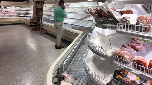 Grocery shoppers experienced a shortage of fresh meats when the coronavirus hit Georgia, as buyers snapped up extra food to store in freezers. Georgia’s chicken producers still have plenty of meat in the pipeline, but the supply chain is taking time to catch up. Christopher Quinn, cquinn@ajc.com