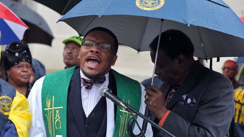 Francys Johnson, the former Georgia president of the NAACP, speaks during the Moral Monday rally at the state Capitol on Jan. 13, 2014.“It’s emotional to step away from doing something you love,” said Johnson.