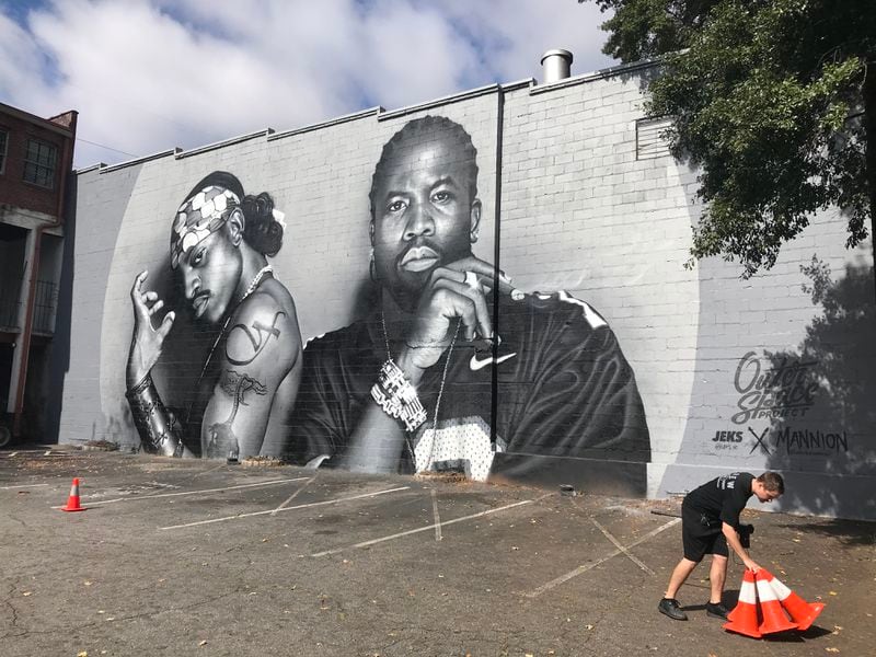 A new 30-foot-tall mural of Atlanta hip-hop legends OutKast was painted on the side of a building in Atlanta's Little Five Points neighborhood. TYLER ESTEP / TYLER.ESTEP@AJC.COM