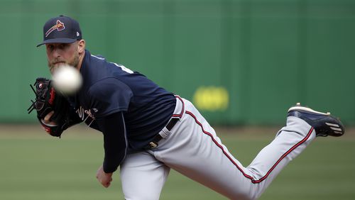Atlanta Braves relief pitcher Ian Krol throws in the sixth inning of a spring training baseball game against the Philadelphia Phillies, Tuesday, March 14, 2017, in Clearwater, Fla. (AP Photo/John Raoux)