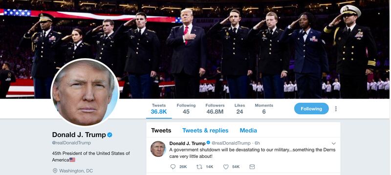  The banner image on President Trump's Twitter page shows him at the national championship game on Jan. 8 in Atlanta, accompanied by ROTC cadets from UGA (left) and Alabama.