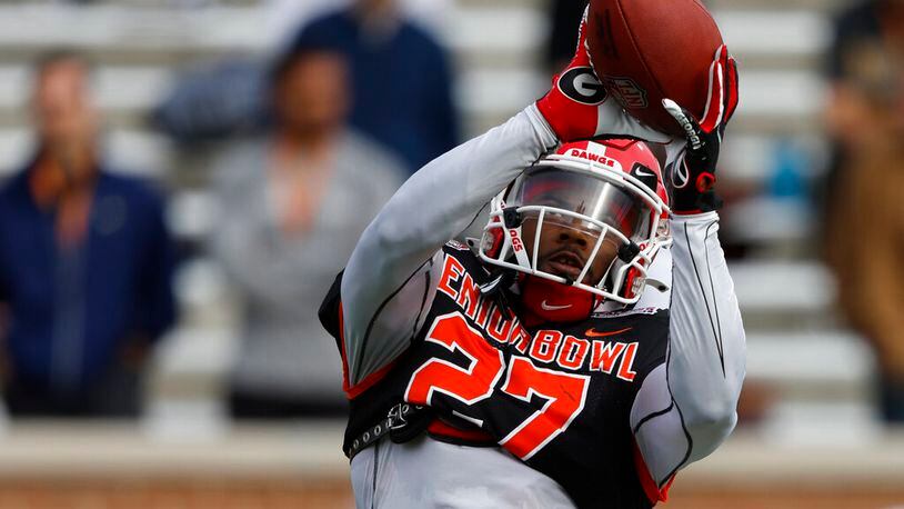American defensive back Christopher Smith II of Georgia (27) during practice for the Senior Bowl NCAA college football game Wednesday, Feb. 1, 2023, in Mobile, Ala.. (AP Photo/Butch Dill)