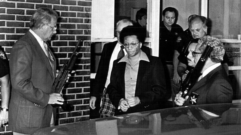 810910 - Wayne B. Williams, accused and charged with two killings in the Atlanta-children's slayings, is taken to a court hearing September 10, 1981. (UPI-Mike Pugh)