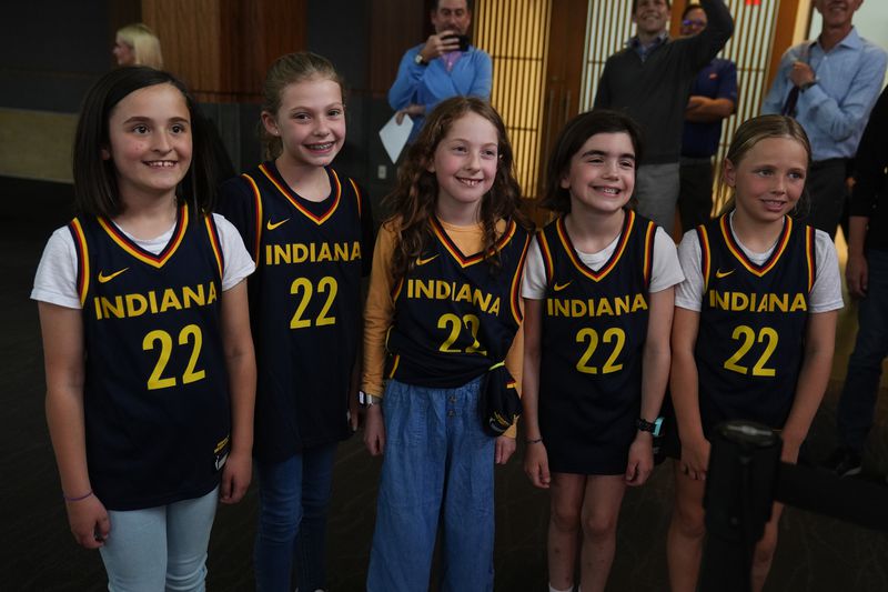 Young fans wait for Indiana Fever's Caitlin Clark to arrive on the Red Carpet before the world premiere and screening of Episode 1 of the upcoming ESPN+ Original Series Full Court Press, Monday, May 6, 2024, in Indianapolis. (AP Photo/Darron Cummings)