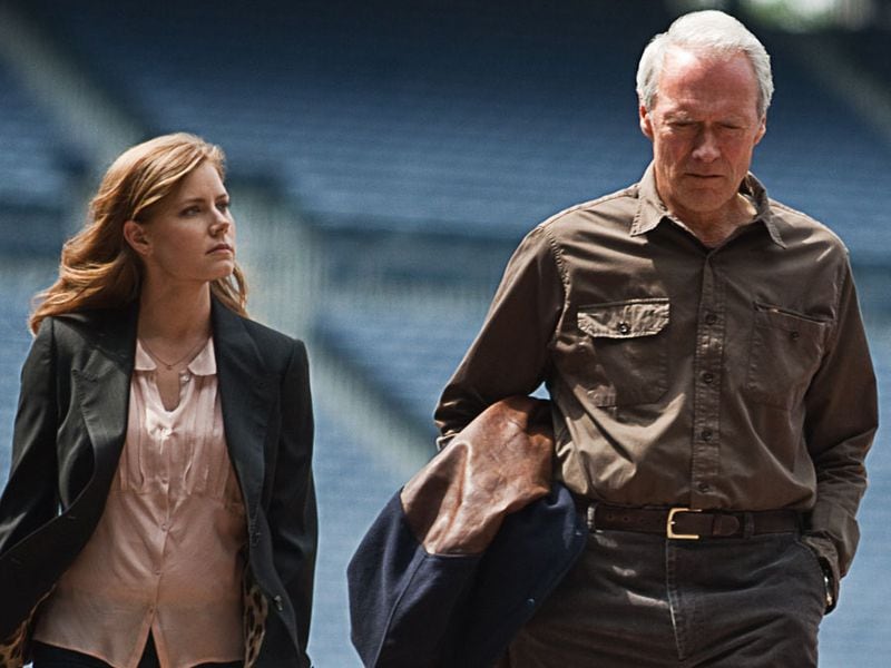 This film image released by Warner Bros. Pictures shows Clint Eastwood, right, and Amy Adams in a scene from "Trouble with the Curve." (AP Photo/Warner Bros. Pictures, Keith Bernstein)