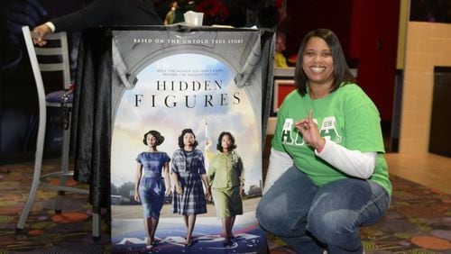 Chantelle Barbour, a member of Alpha Kappa Alpha, at the film “Hidden Figures” in Louisville, Ky. Nationwide, AKA chapters are organizing to support the film. CONTRIBUTED BY RHONDA DUNN PHOTOGRAPHY