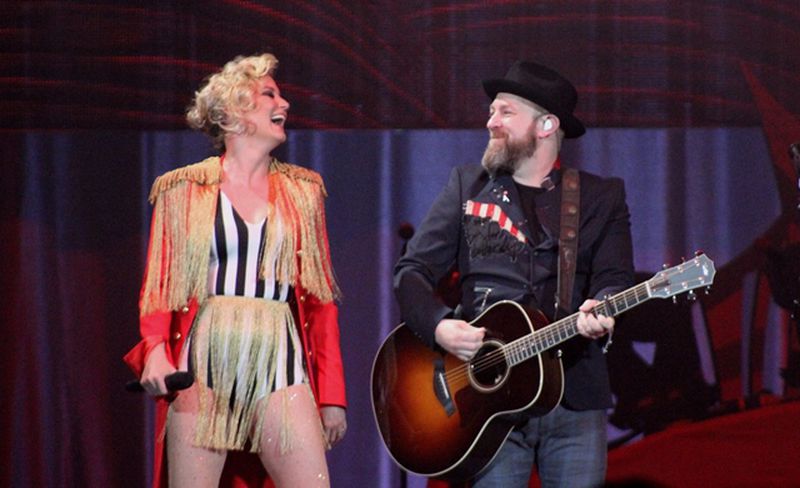 Jennifer Nettles and Kristian Bush share a smile as Sugarland takes the stage for the first date of their first tour in five years on May 25, 2018 in Augusta. Photo: Melissa Ruggieri/AJC