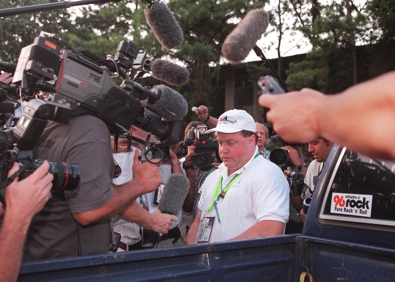 Richard Jewell is swamped by the media in Atlanta upon arriving at his Buford Highway apartment after being interviewed at FBI headquarters on July 30, 1996. L. Lin Wood, who represented Jewell, recently said of Jewell, "I wasn’t going to turn the lights out on my client, even after he was dead, until I did what I told him I was going to do, which was get truth and justice for him.” (Cox Staff Photo/Greg Lovett)