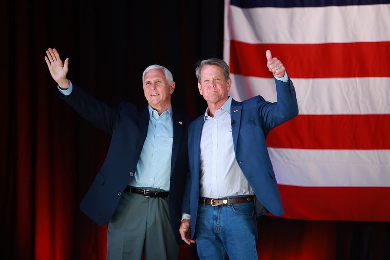 Former Vice President Mike Pence, left, and Gov. Brian Kemp campaign earlier this year. Kemp spokesman Tate Mitchell said, “The governor has consistently praised the accomplishments of the Trump-Pence administration and is appreciative of everything the former president and his team did for Georgia during very challenging times in our state and nation,” even though Trump frequently attacked Kemp for not doing enough to overturn the 2020 election. help him win. (Joe Raedle/Getty Images/TNS)