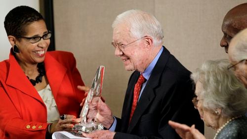 Judge Ann Claire Williams. 7th U.S. Circuit Court of Appeals, left, presents former President Jimmy Carter with an award recognizing his appointment of a large number of minority and female judges to the federal judiciary during his presidency, Thursday, June 14, 2012, in Atlanta. The Just the Beginning Foundation honored Carter with its Trailblazer Legend Award.