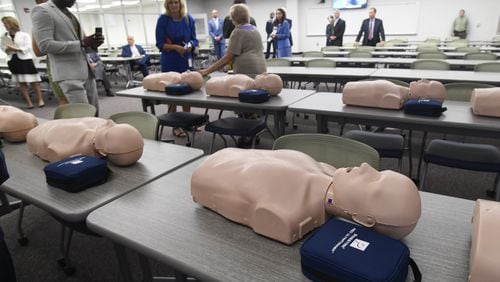 CPR dummies lie on a table in a lecture at McClure Health Science High School in Gwinnett County. CPR and the use of automatic external defibrillators increase odds of surviving sudden cardiac arrest. JOHN AMIS / SPECIAL TO THE AJC