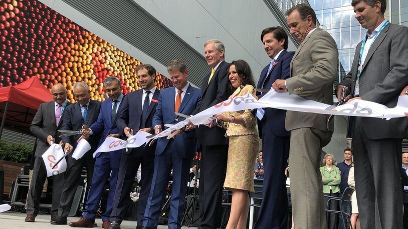 Dignitaries including Gov. Brian Kemp, Georgia Tech President G.P. “Bud” Peterson and Invest Atlanta CEO Eloisa Klementich cut the ribbon at the opening ceremony for Coda at Technology Square in Midtown. J. SCOTT TRUBEY@AJC.COM