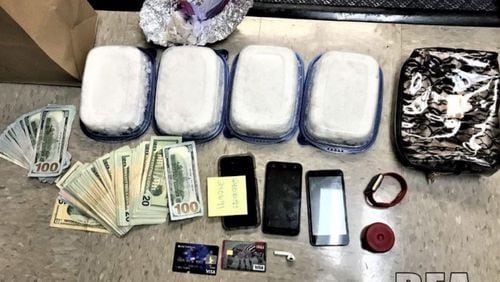 The operation resulted in the seizure of more than 58 kilograms of meth, more than two kilograms of heroin, 31 guns, and $56,000, authorities said.