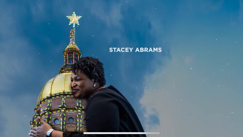A Republican Governors Association attack ad features an image of Stacey Abrams embracing the Gold Dome.