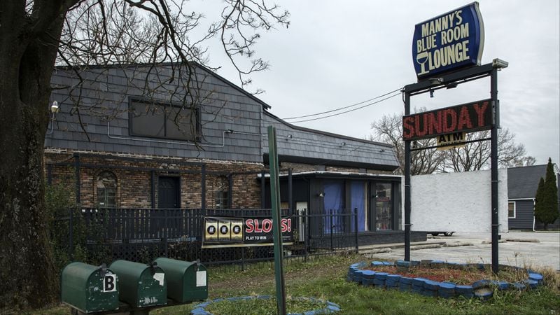 Manny's Blue Room Lounge, pictured, was the scene of the fatal police shooting of armed security guard Jemel Roberson early Sunday, Nov. 11, 2018, in Robbins, Illinois. Roberson, 26, was killed by a Midlothian police officer as he subdued an alleged gunman who shot several people in the bar outside of Chicago. Roberson was armed with a licensed weapon when he was killed.