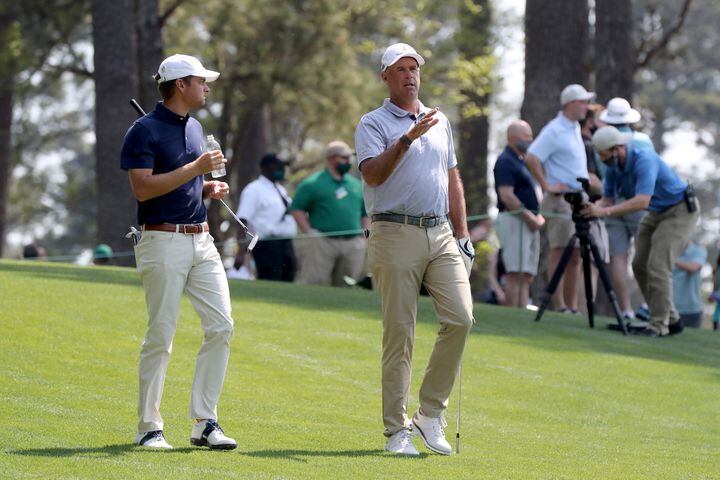 April 7, 2021, Augusta: Former Georgia Tech golfers Tyler Strafaci, left, and Stewart Cink walk to the fourth green after their tee shot during their practice round for the Masters at Augusta National Golf Club on Wednesday, April 7, 2021, in Augusta. Curtis Compton/ccompton@ajc.com