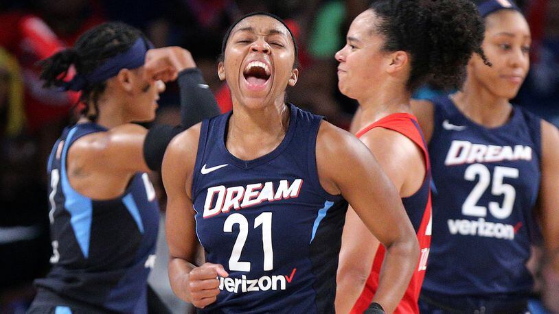 Dream guard Renee Montgomery reacts to a score against the Washington Mystics on Sunday, August 26, 2018, in Atlanta. Curtis Compton/ccompton@ajc.com