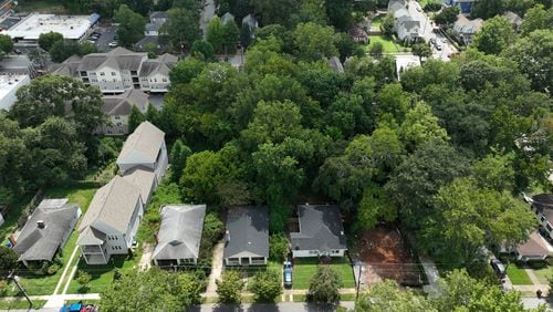 An aerial view of tree canopies covering residential housing in the Reynoldstown neighborhood on Thursday, September 8, 2022. (Hyosub Shin / Hyosub.Shin@ajc.com)