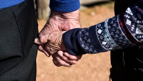 SAN ANTONIO, TEXAS - DECEMBER 10, 2018:  An elderly couple walk hand-in-hand in San Antonio, Texas. (Photo by Robert Alexander/Getty Images)