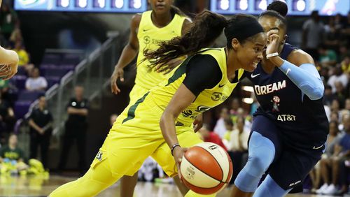 Seattle Storm guard Jordin Canada heads to the basket for another two points against the Atlanta Dream, Sunday, Sept. 1, 2019, in Seattle.