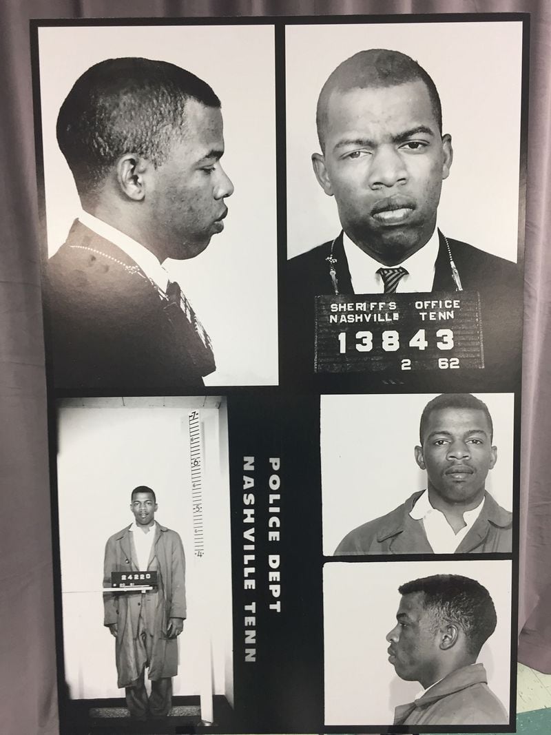 This combination of photographs provided by the Nashville Police Department shows recently discovered never-before-published photos of civil rights icon John Lewis' arrest while leading an effort to desegregate the city's lunch counters in the early 1960's in Nashville. Mayor Megan Barry surprised Lewis with the records Saturday, Nov. 19, 2016, while he was on stage at the Nashville Public Library to receive a literary award. (Nashville Police Department via AP)