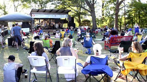 Residents enjoy live music at the Greenprints Alliance Trailfest 2016 in Woodstock. This year’s fund-raising event for the trail advocacy organization is May 6. GREENPRINTS ALLIANCE