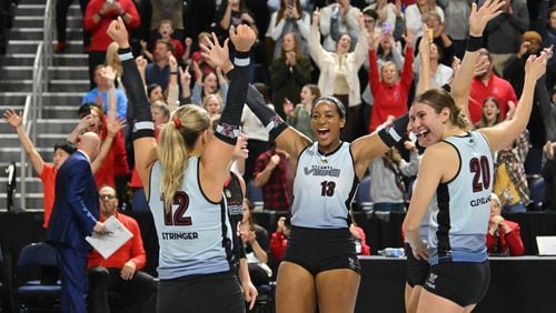 Atlanta Vibe players celebrate their 3-0 win over San Diego Mojo during Atlanta Vibe’s first home opener in a Pro Volleyball Federation game at Gas South Arena, Feb. 1, 2024, in Atlanta. (Hyosub Shin / Hyosub.Shin@ajc.com)