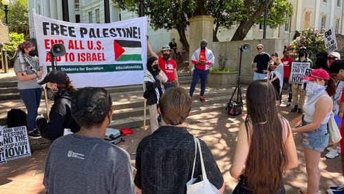 A group of demonstrators protesting Israel's war in Gaza gathered in front of The Arch entrance at the northern end of the University of Georgia's campus in Athens on Wednesday, May 1, 2024.