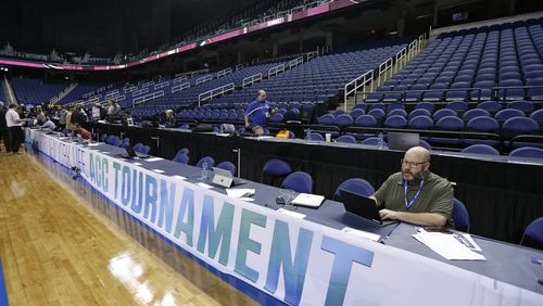 Greensboro Coliseum is mostly empty after the NCAA college basketball games were canceled at the Atlantic Coast Conference tournament Thursday, March 12, 2020,  in Greensboro, N.C.