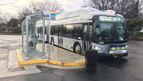 A MARTA bus waits for passengers at its Southlake Mall stop in Clayton County.