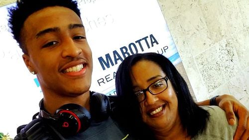 John Collins and his mother, Lyria, who recognized her son’s basketball talent at a young age. (Contributed photo to Palm Beach Post)