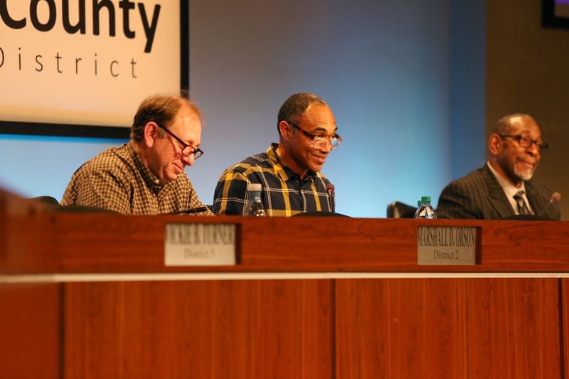 From left, DeKalb County Board of Education vice chairman Marshall Orson, chairman Michael Erwin and DeKalb County School District Superintendent Steve Green during a meeting at school district headquarters on Feb. 13. (EMILY HANEY / emily.haney@ajc.com)